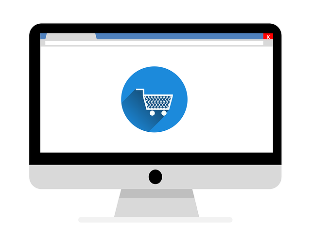 computer monitor with shopping cart in blue icon